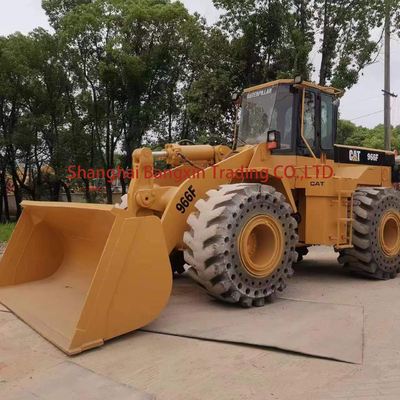 Chargeur à roues CAT 966F d'occasion avec un temps de travail réduit de 0 à 2000 heures, pesant 20000 à 21000 kg