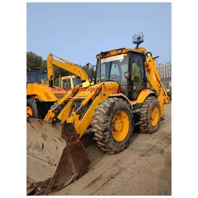 4 tonnes de poids de fonctionnement Utilisé JCB 4CX chargeur de remorqueuse chargeur de creusement machine d'occasion