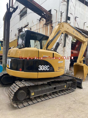 Excavateur CAT 308C d'occasion avec une capacité de seau de 0,3 m3 en excellent état