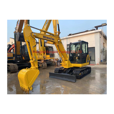 En bon état, utilisée, excavatrice Komatsu PC56 toutes les fonctions normales 7 jours de livraison