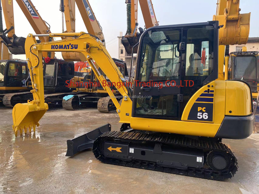 En bon état, utilisée, excavatrice Komatsu PC56 toutes les fonctions normales 7 jours de livraison