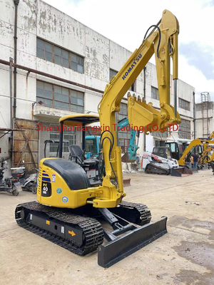Excavateur Komatsu PC40MR-3 d'occasion au Japon avec et 0,19 capacité de seau